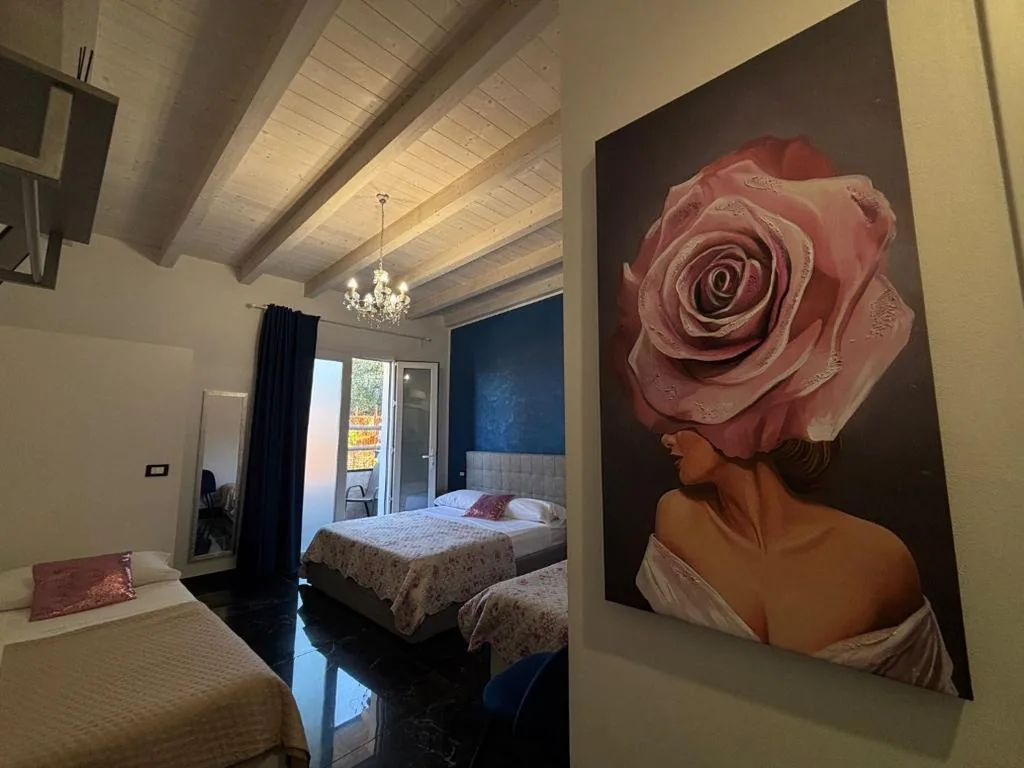 Camera Quadrupla con Terrazza — Garda Relais Luna Blu