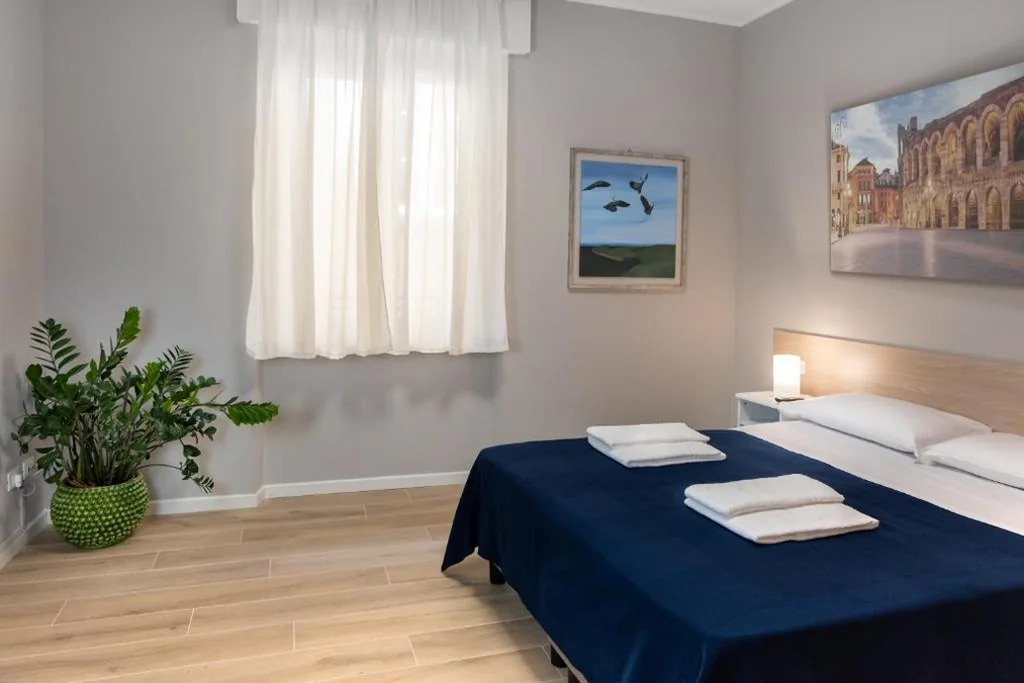 Quadruple Room with Terrace — La Nuova Corte Rooms