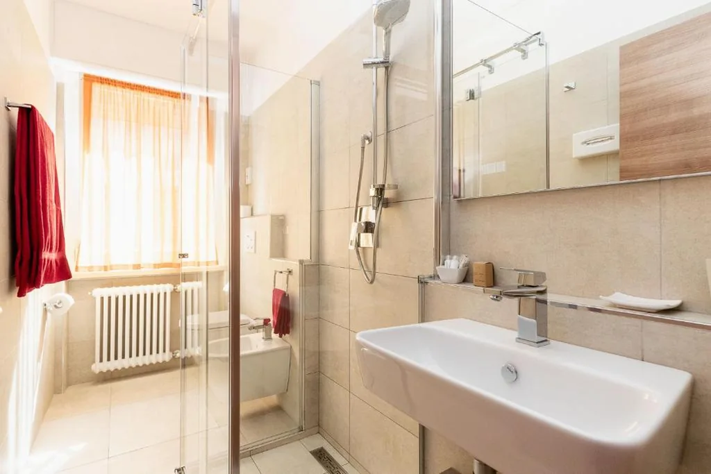 Quadruple Room with Lake View - Upper Floor — Hotel Garni Ischia