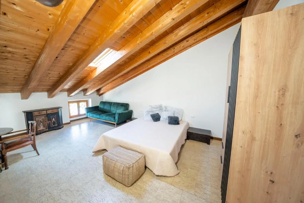 Camera Quadrupla Deluxe — Five Elements Apartments Nature and Relax near Lake Garda