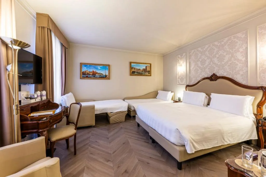Camera Quadrupla Deluxe — Hotel Colombina