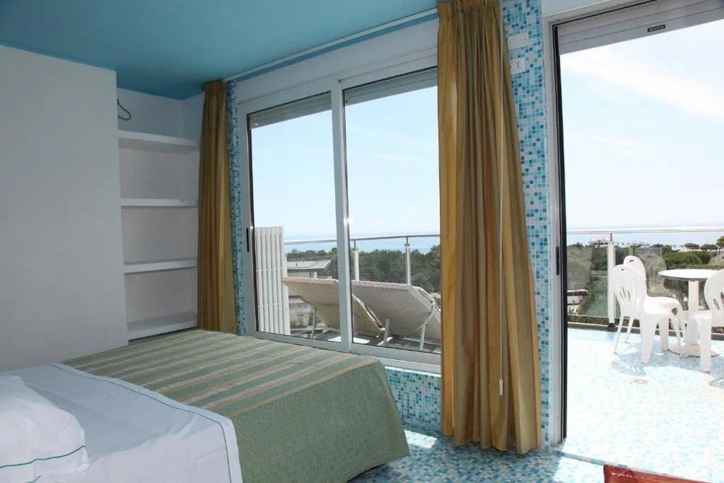 Deluxe Quadruple Room — Hotel Soraya & Apartments
