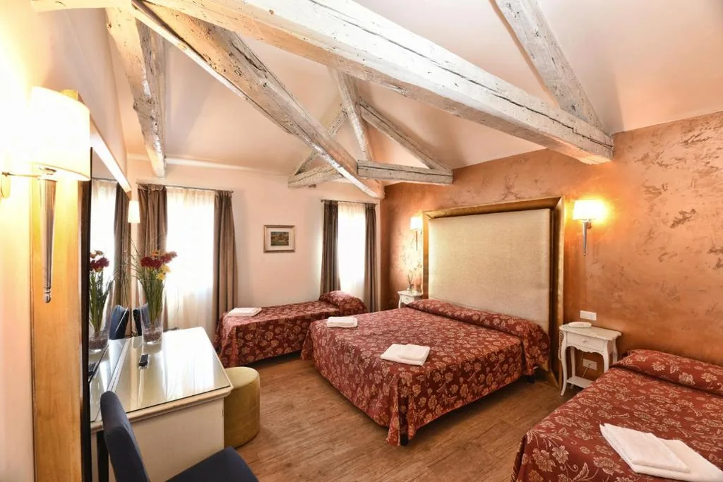 Deluxe Quadruple Room — Locanda Casa Martini