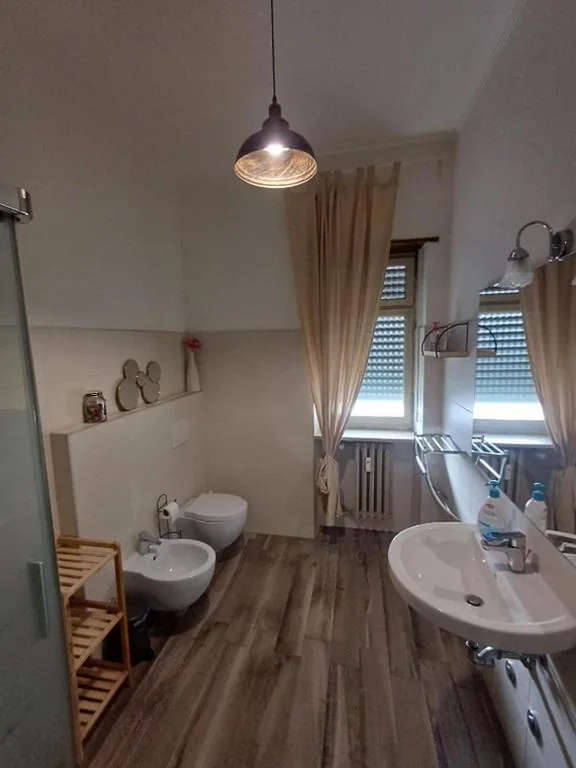 Economy Quadruple Room with Shared Bathroom — L’Arena Residence