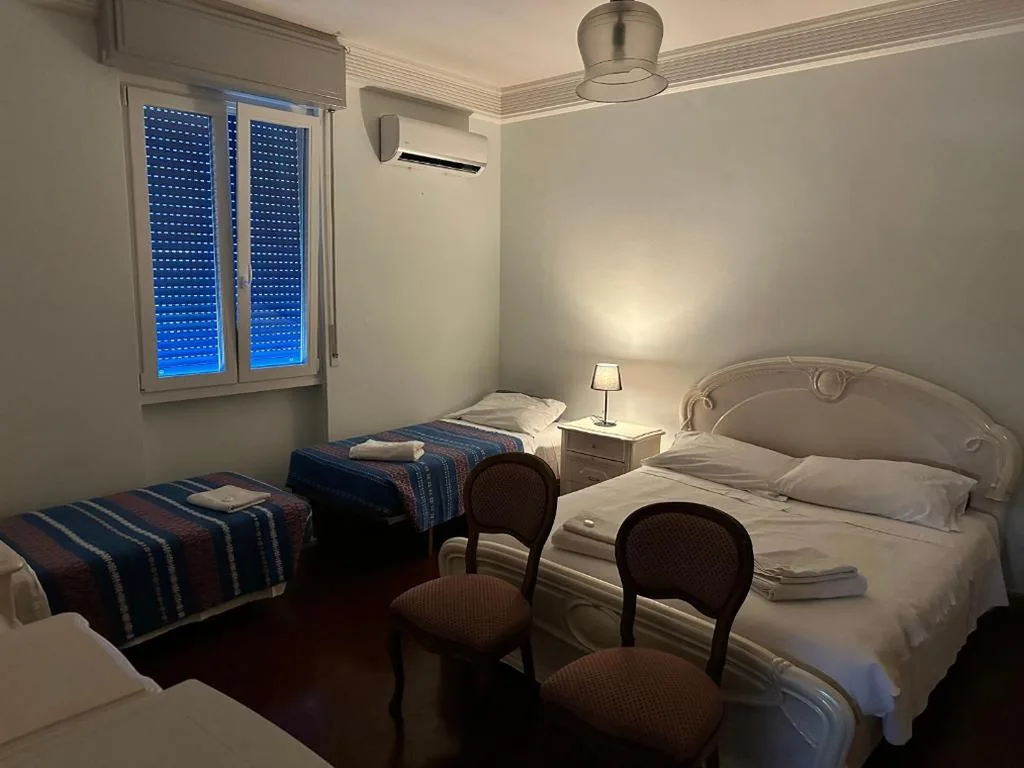 Economy Quadruple Room with Shared Bathroom — Mavipagi 2