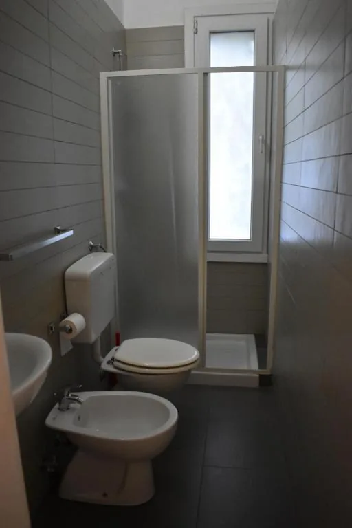 Economy Quadruple Room with Shared Bathroom — Nuova Locanda Belvedere