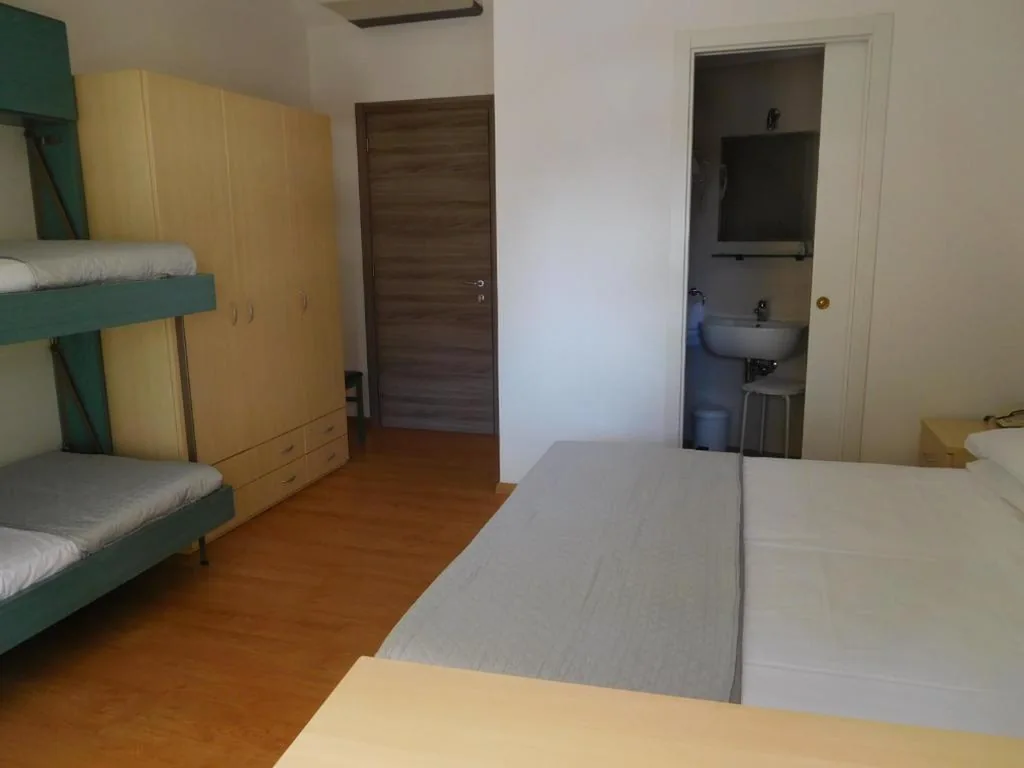 Economy Quadruple Room — Hotel Emperador