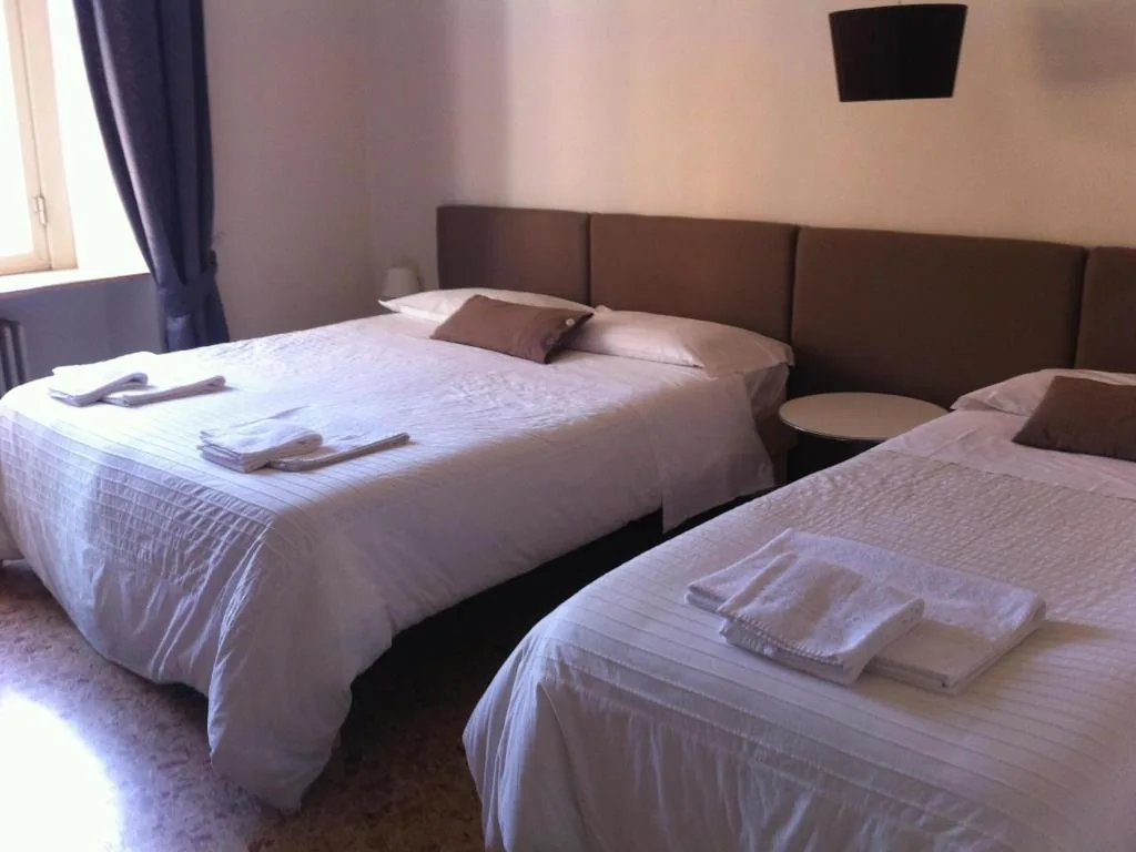 Economy Quadruple Room — Residenza Navona Verona