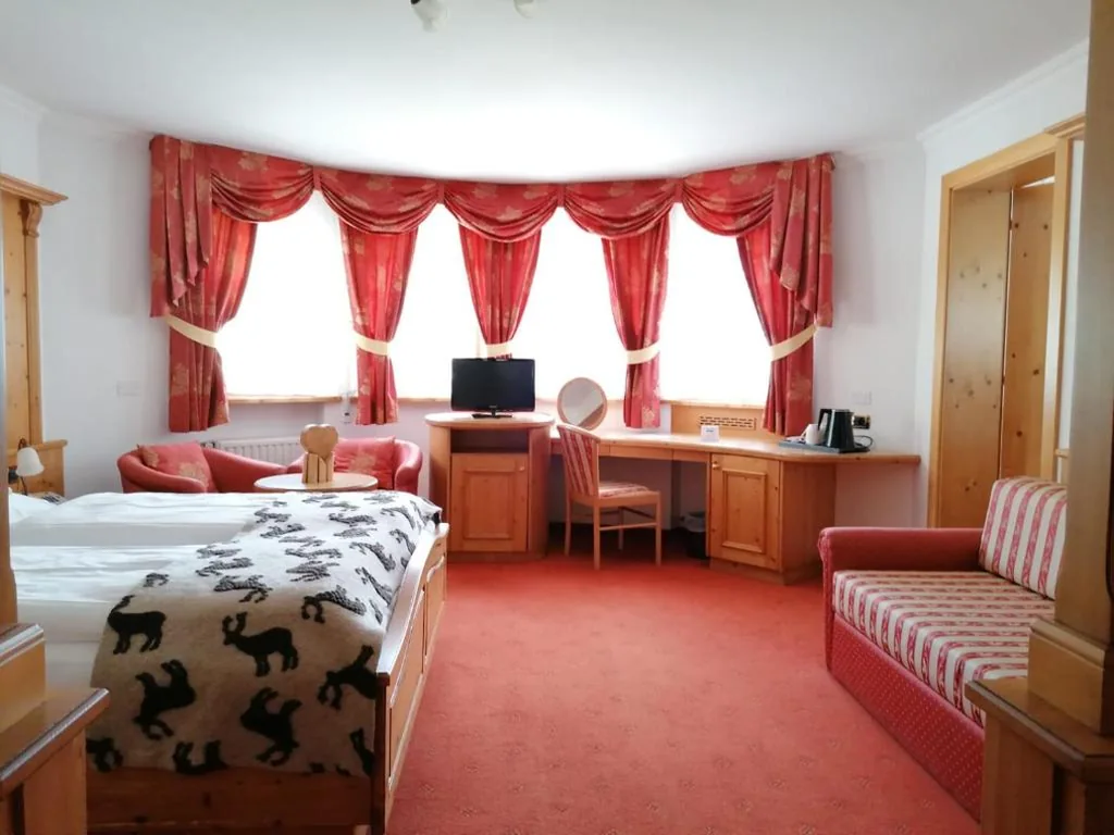Quadruple Room — Hotel Alpenrose