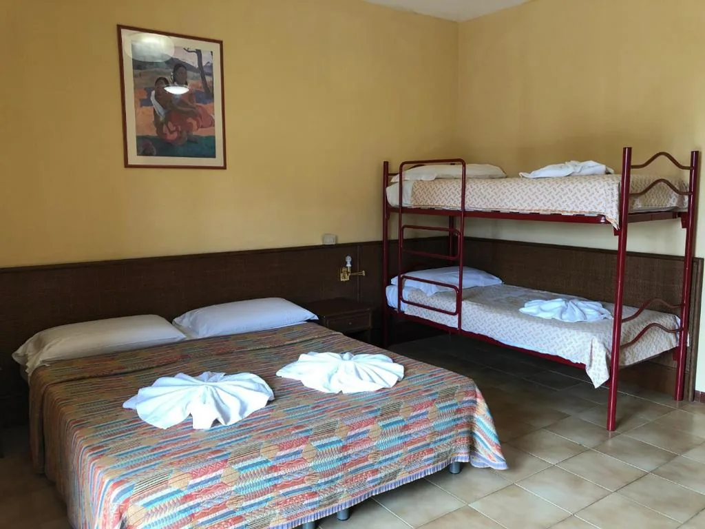 Quadruple Room — Hotel AMALFI & Restaurant Karaoke Bar