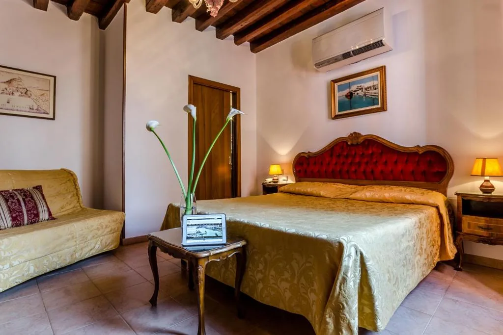 Quadruple Room — Hotel Ariel Silva