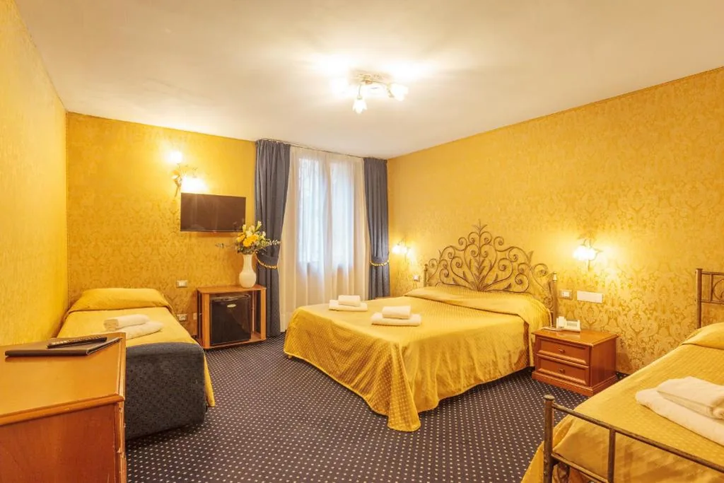 Quadruple Room — Hotel Castello