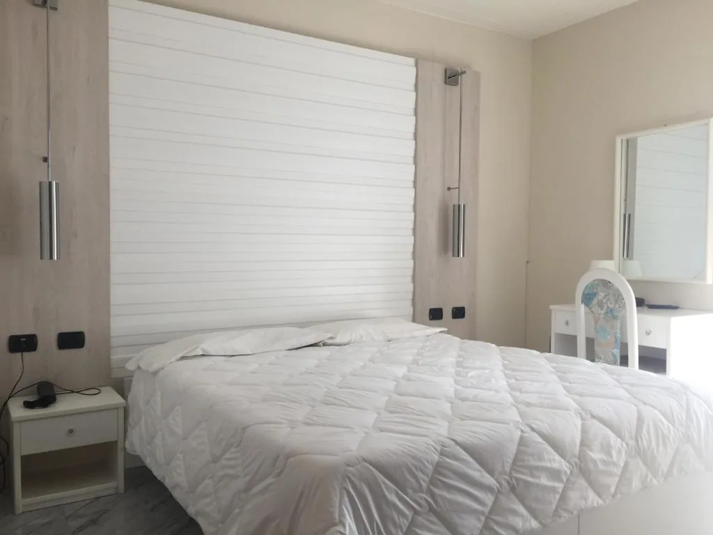 Quadruple Room — Hotel Consuelo
