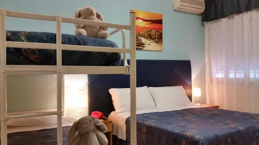 Quadruple Room — Hotel Danubio