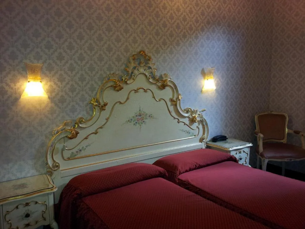 Quadruple Room — Hotel Diana