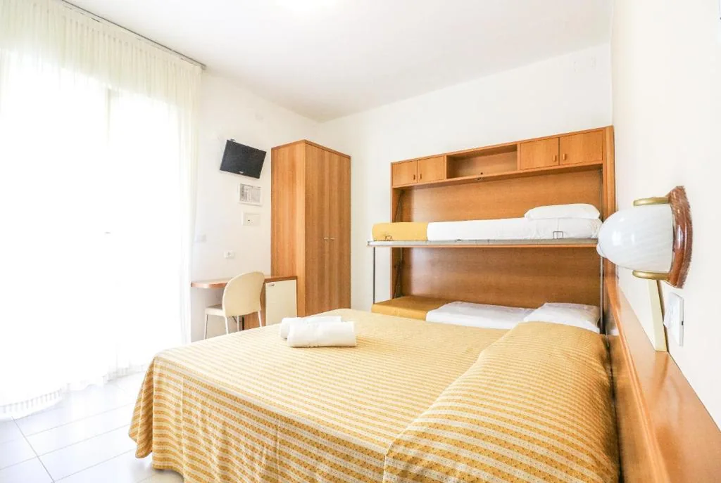 Quadruple Room — Hotel Jesulum