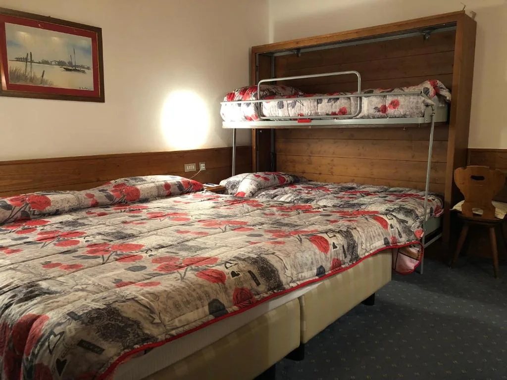 Quadruple Room — Hotel Majoni