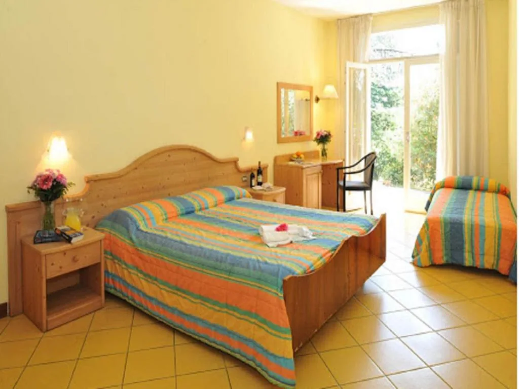 Quadruple Room — Hotel Marco Polo