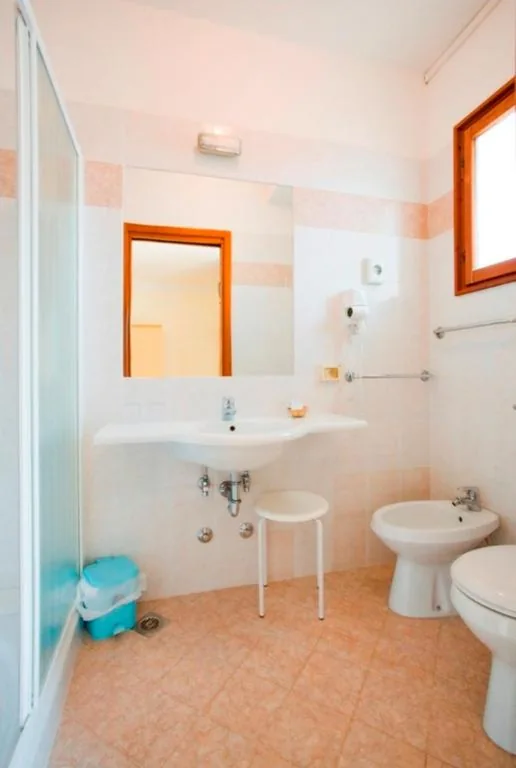 Quadruple Room — Hotel Marietta