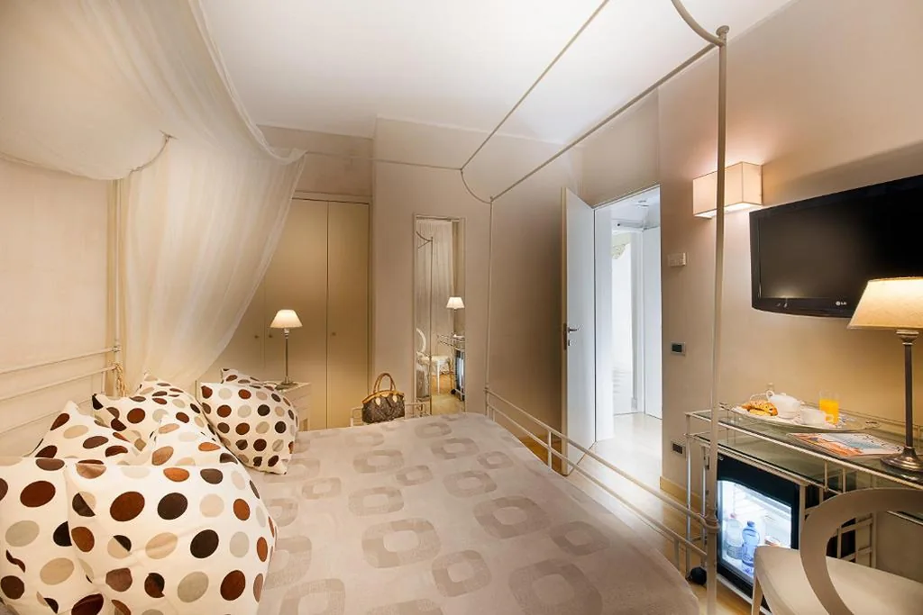 Quadruple Room — Hotel Mastino