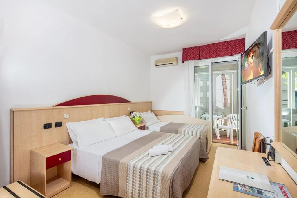 Quadruple Room — Hotel Regina