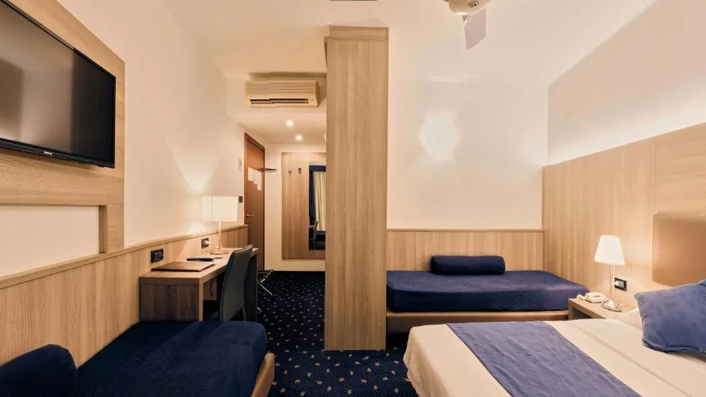 Quadruple Room — Hotel Roberta
