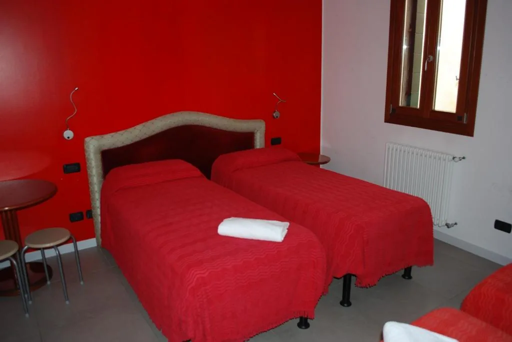 Quadruple Room — Hotel San Geremia