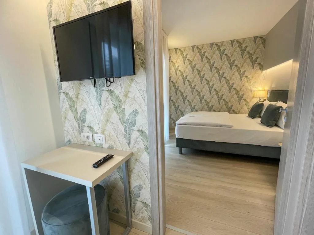 Quadruple Room — Hotel Stella Alpina