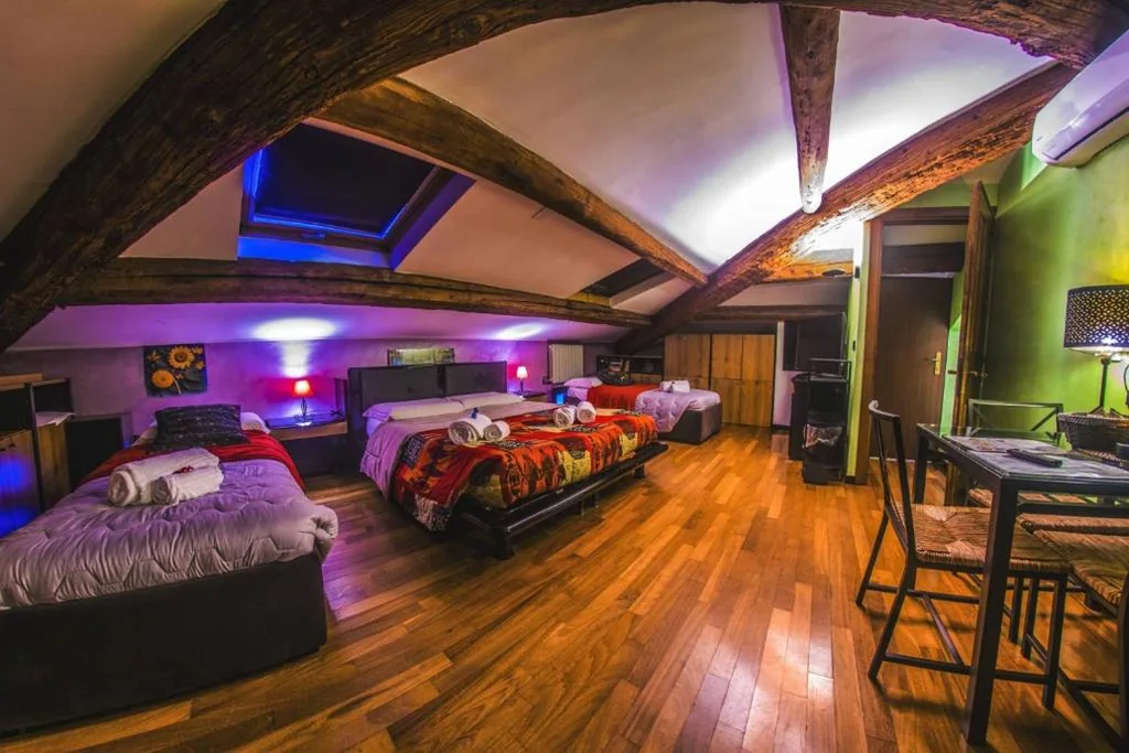 Attic Quadruple Room - Historic Building — Marconi Rooms and Apartments