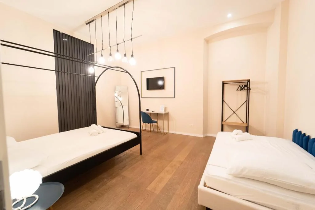 Camera Quadrupla Premium — Eufemia Suites