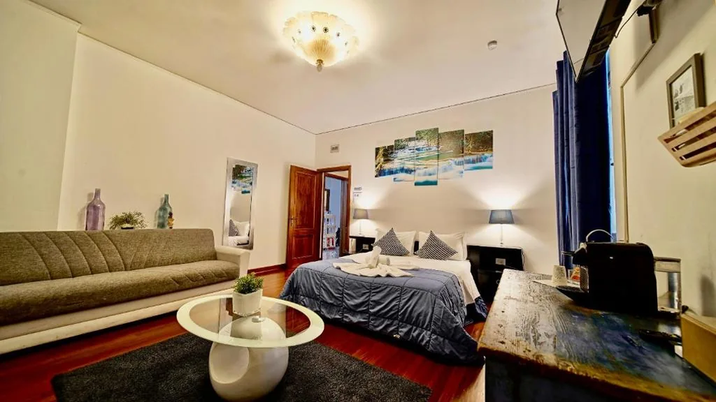 Camera Quadrupla Premium — Vitti’s Home Verona