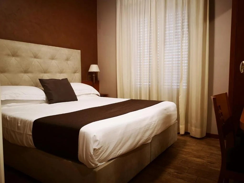Standard Quadruple Room — Hotel Clarin 14 by Dori