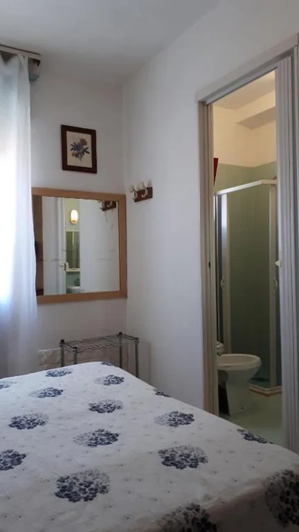 Standard Quadruple Room — Hotel Villa Dina