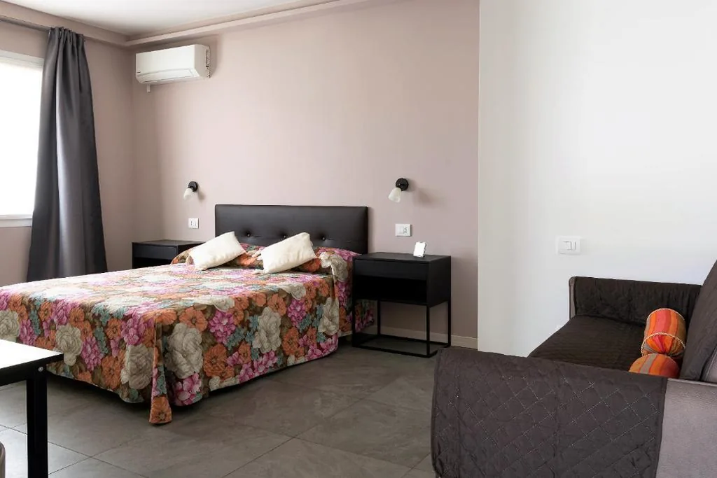Standard Quadruple Room — Il Melograno
