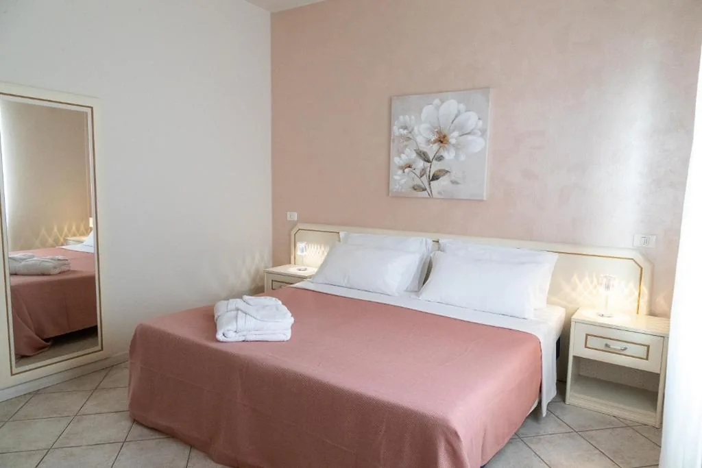 Standard Quadruple Room — La Maison du Port