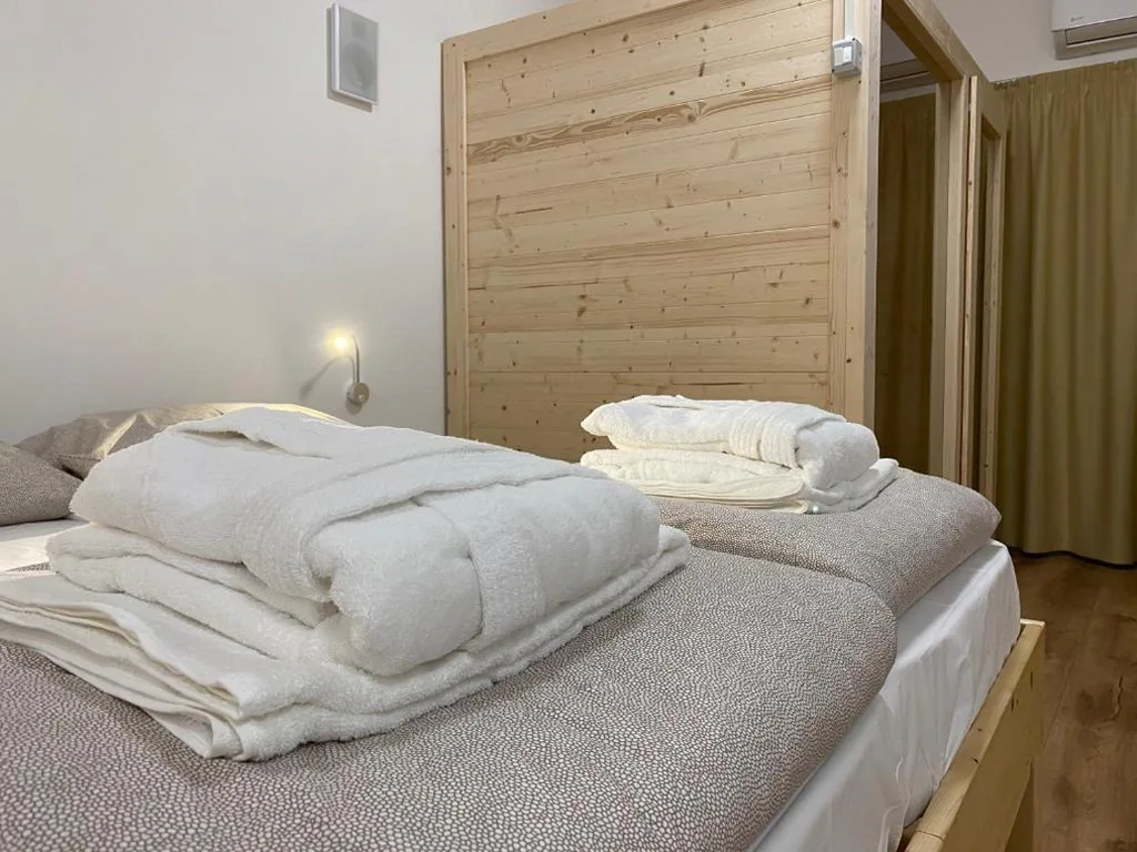 Superior Quadruple Room with Private Sauna — Sky Garden & Wellness R.