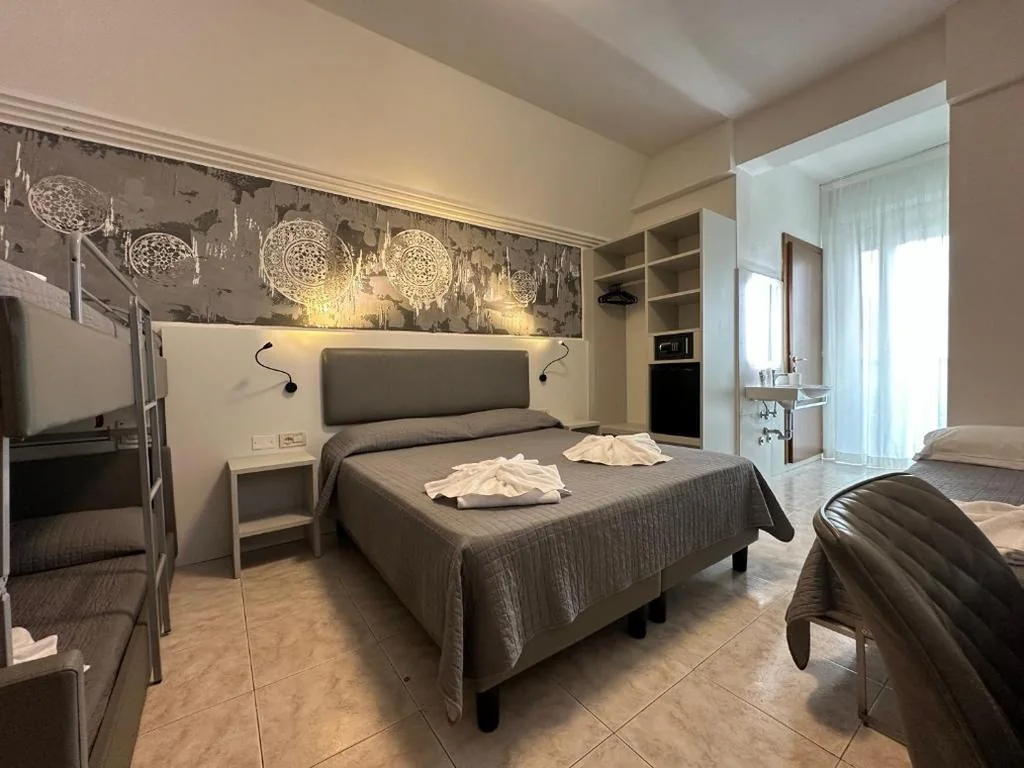 Superior Quadruple Room with Terrace — Hotel DOLCEVITA Park & Beach included