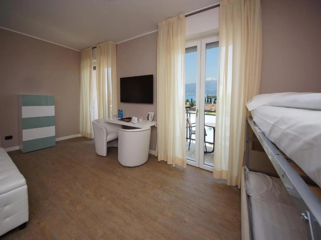 Superior Quadruple Room — Hotel Clarin 14 by Dori