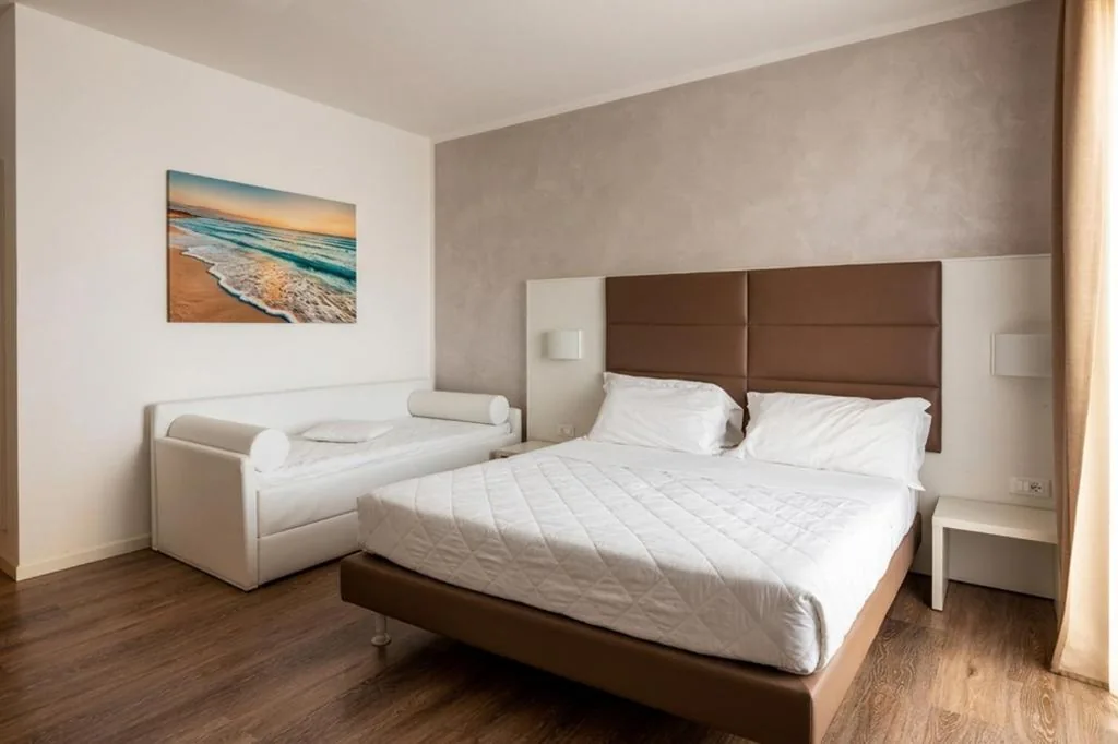 Superior Quadruple Room — Hotel Columbia & Ninfea