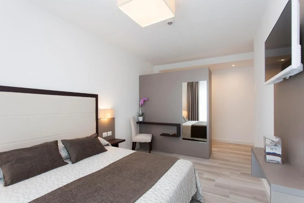 Camera Quadrupla Superior — Hotel Greif