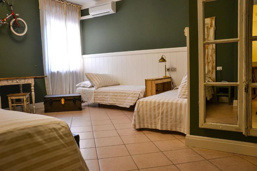 Superior Quadruple Room — Hotel Maximilian