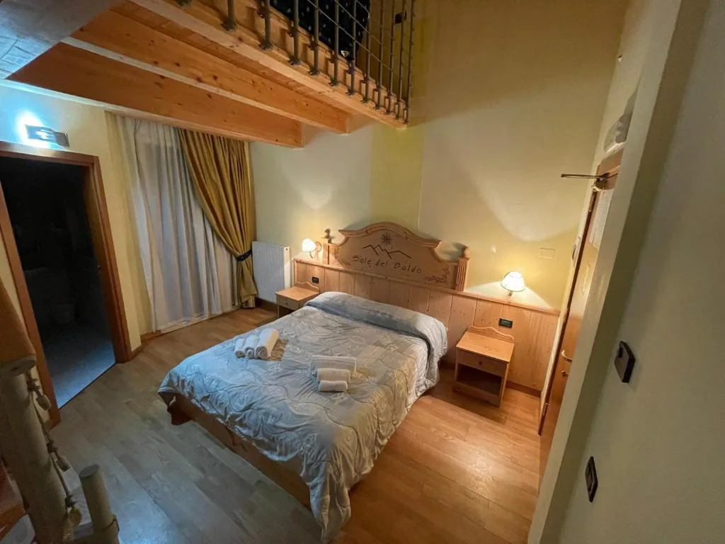 Superior Quadruple Room — Hotel Sole del Baldo