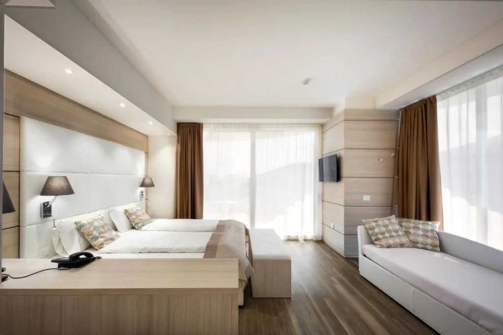 Camera Quadrupla Superior — International Beach Hotel