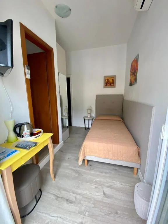 Single Room with Balcony — Hotel Alpino