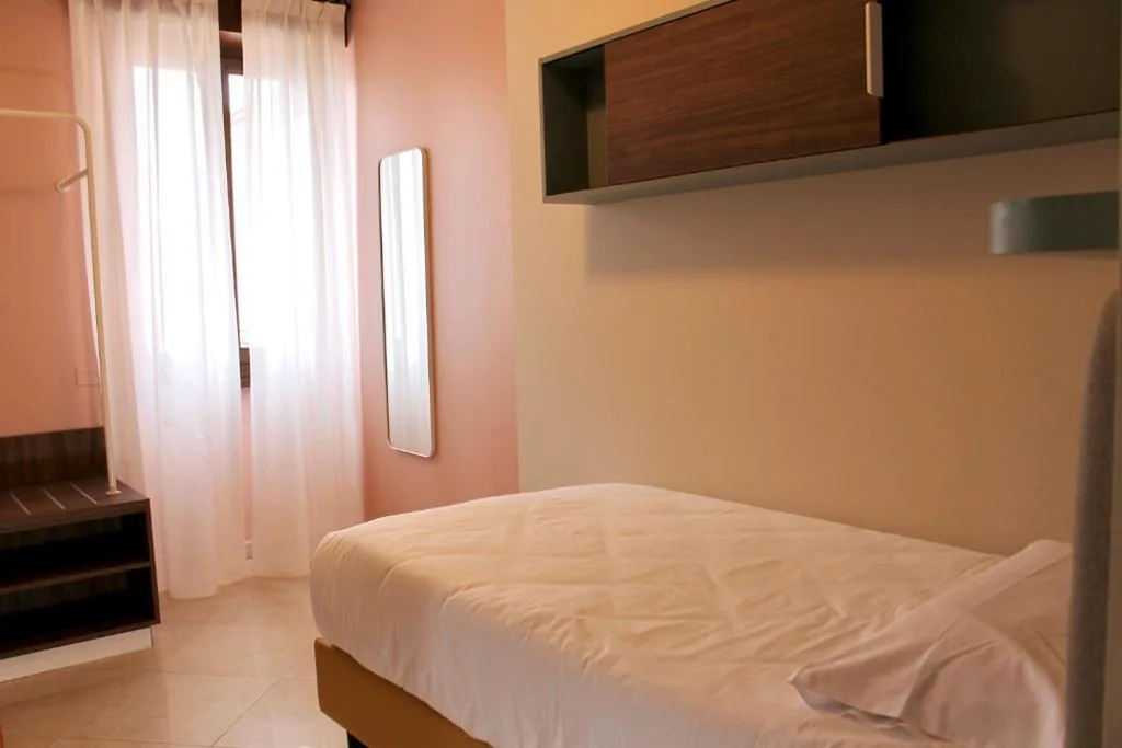 Single Room with Partial Lake View — La Vista Postcard Hotel