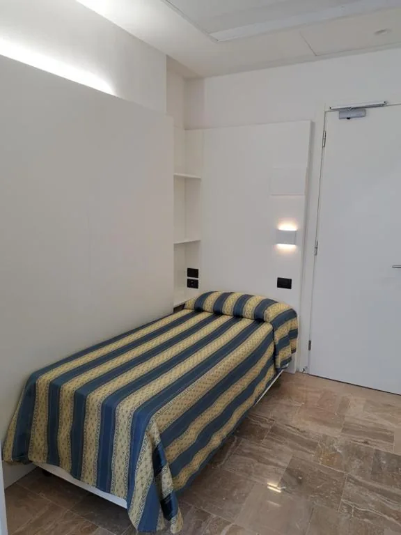 Economy Single Room — Hotel Consuelo