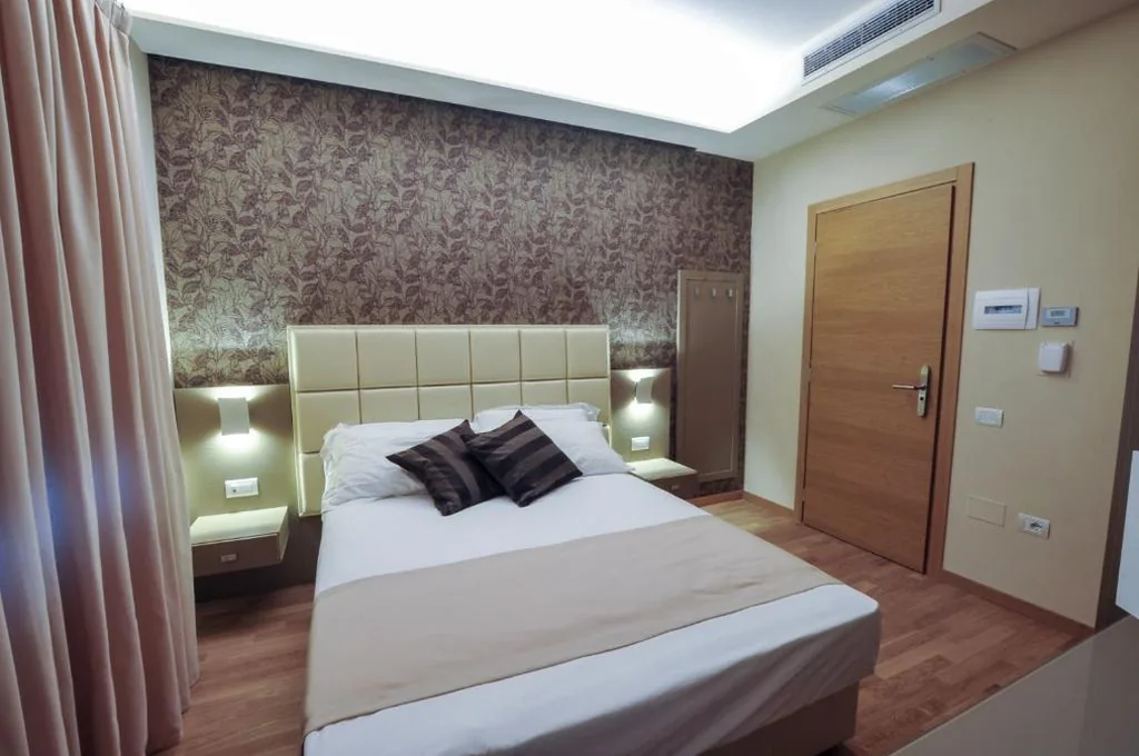 Single Room — Hotel Dori
