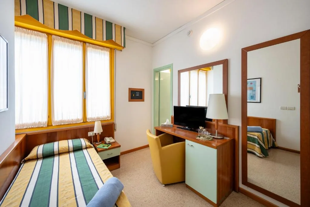 Single Room — Hotel Luna