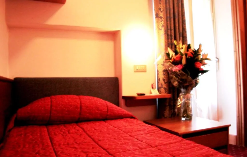 Single Room — Hotel Majoni
