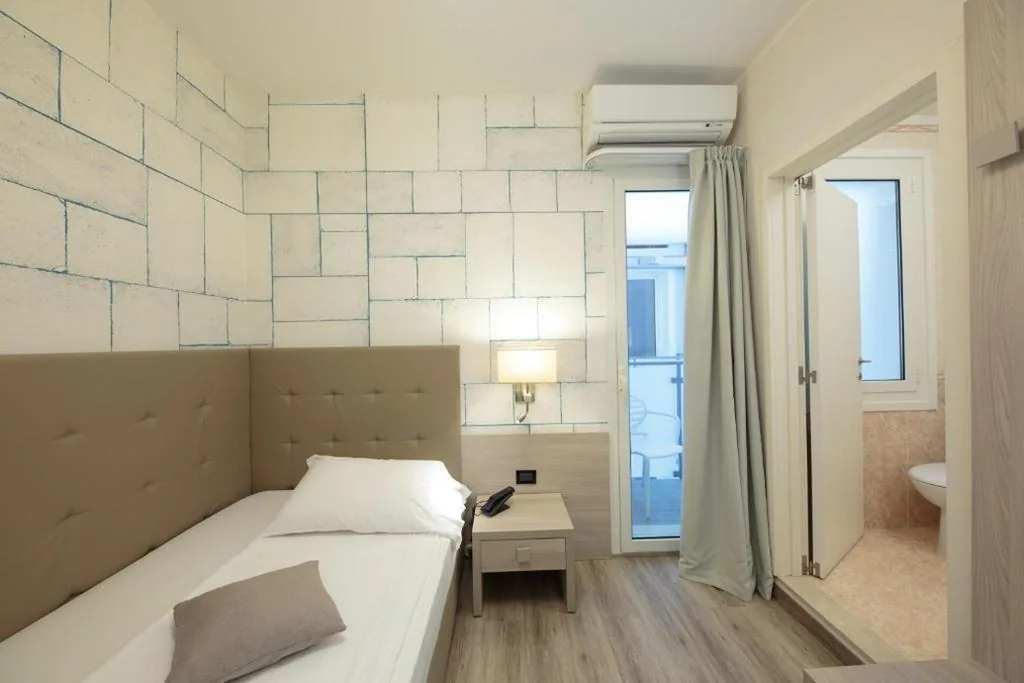 Small Single Room — Hotel Monaco